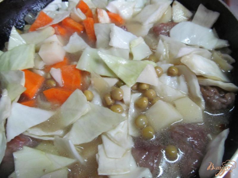 Фото приготовление рецепта: Рагу из свинины с овощами шаг №8
