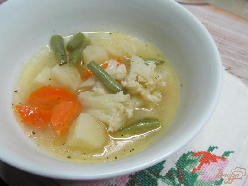 Фото приготовление рецепта: Суп из овощей с кукурузной крупой шаг №7