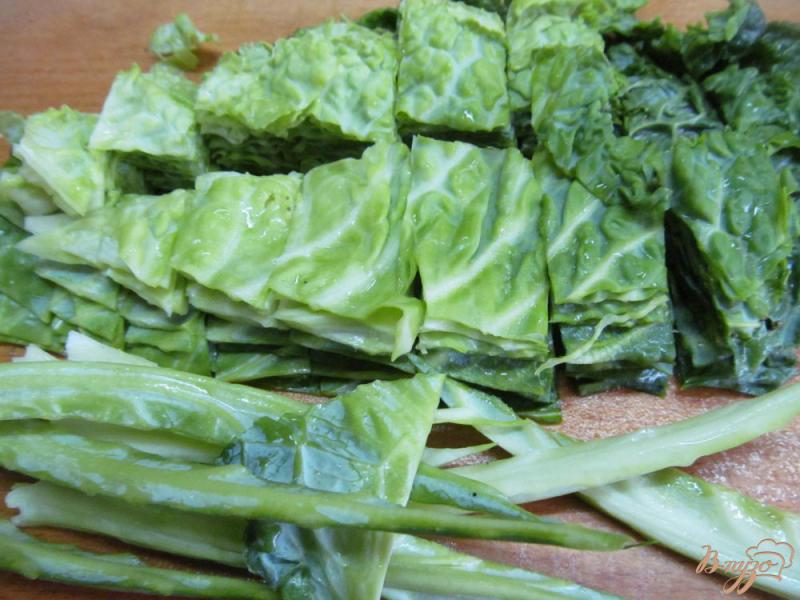 Фото приготовление рецепта: Солянка из савойской капусты с фаршем шаг №4