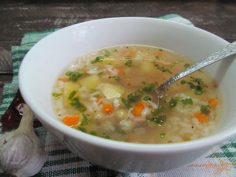 Фото приготовление рецепта: Рисовый суп с горошком и хреном на баранине шаг №9