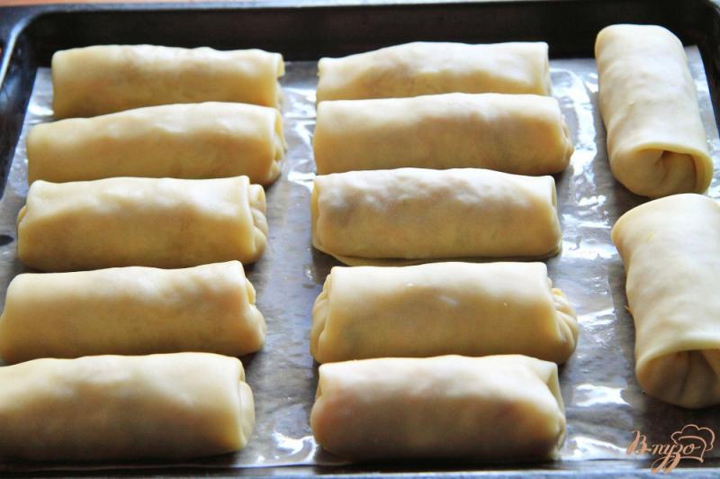 Фото приготовление рецепта: Молдавские пирожки Вэрзэре с тушеной капустой шаг №14