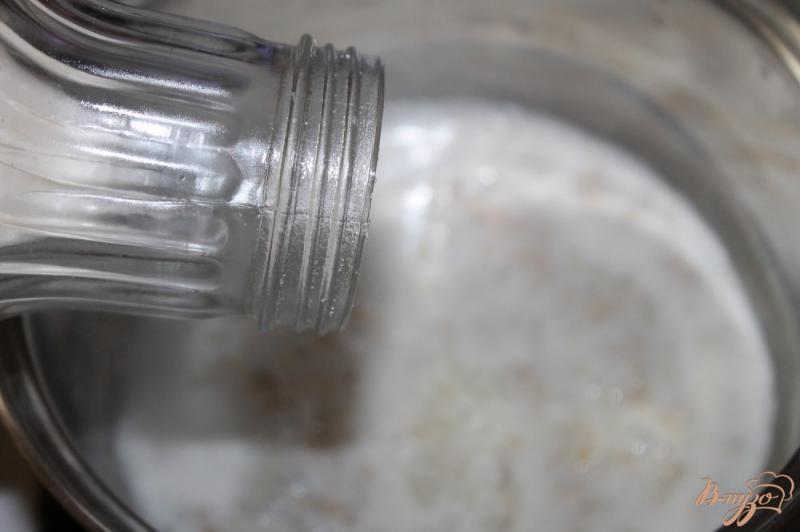 Фото приготовление рецепта: Овсянка на молоке с воздушными шариками «Nestle» шаг №3