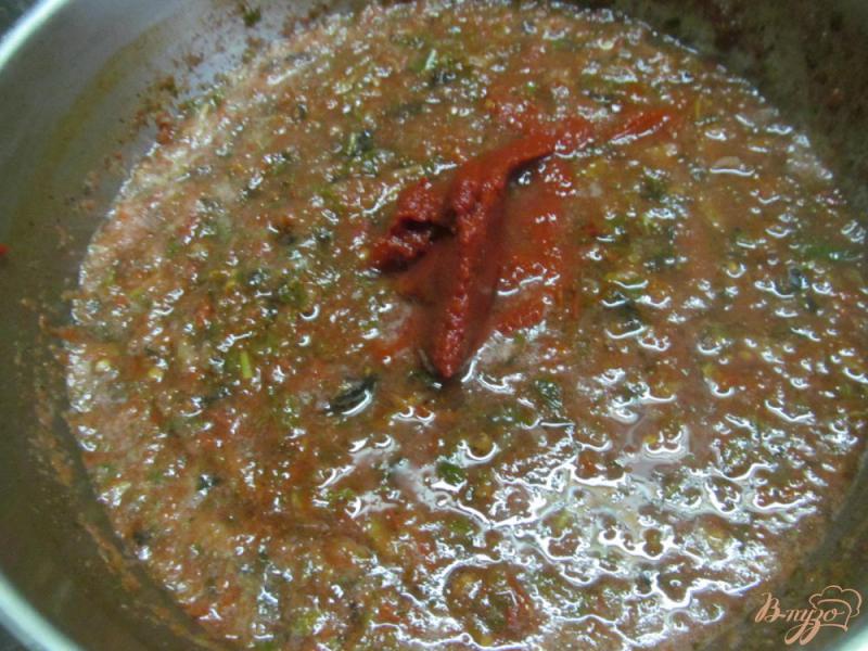 Фото приготовление рецепта: Томатный соус «Сацебели» шаг №4