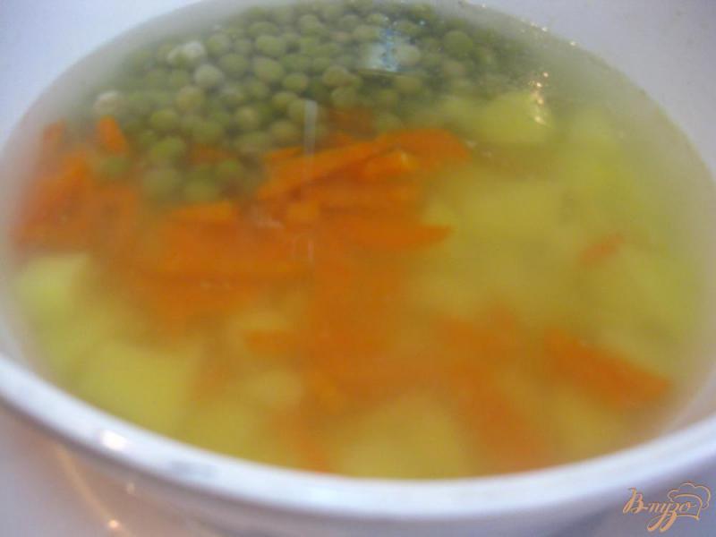 Фото приготовление рецепта: Гороховый суп с ребрышками шаг №8
