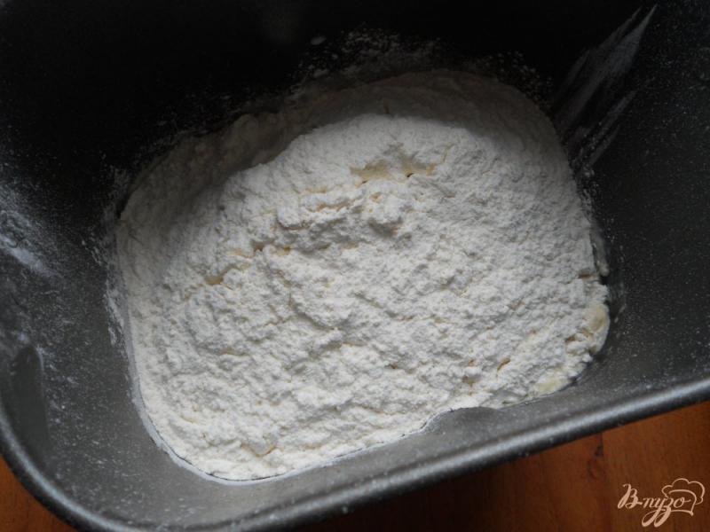 Фото приготовление рецепта: Хлеб на сметане в хлебопечке шаг №2