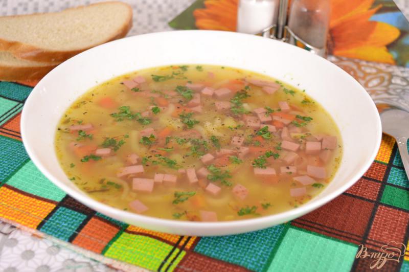 Фото приготовление рецепта: Картофельный суп с колбасой шаг №8