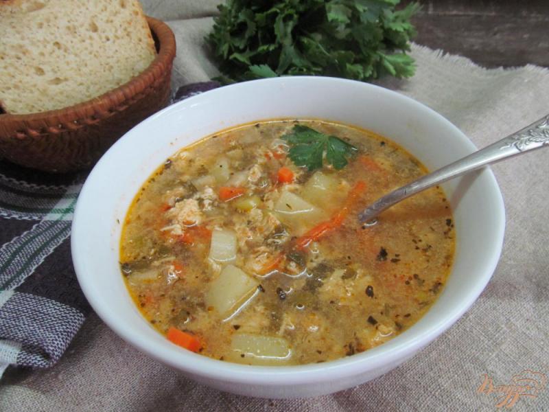 Фото приготовление рецепта: Суп со щавелем на рыбном бульоне шаг №13
