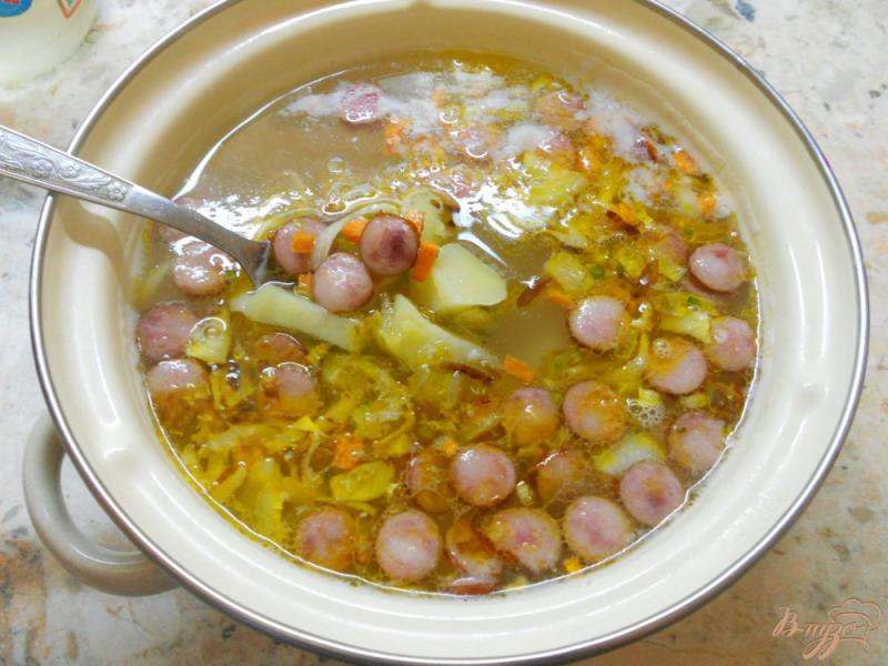 Фото приготовление рецепта: Суп с рисом и егерскими колбасками шаг №6