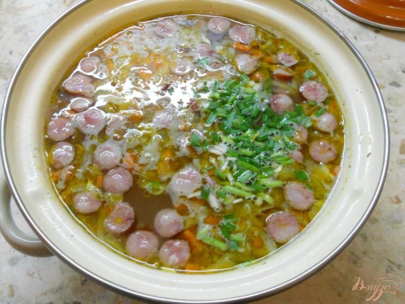 Фото приготовление рецепта: Суп с рисом и егерскими колбасками шаг №7