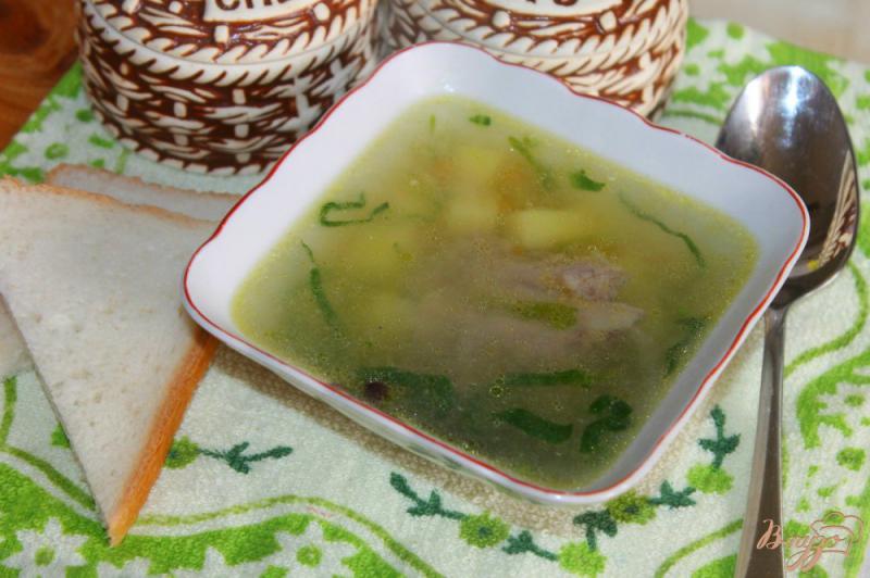 Фото приготовление рецепта: Картофельный суп со шпинатом и свиными ребрами шаг №8