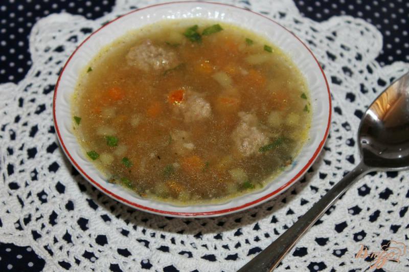 Фото приготовление рецепта: Суп с ленивыми фрикадельками, баклажаном и вермишелью шаг №8