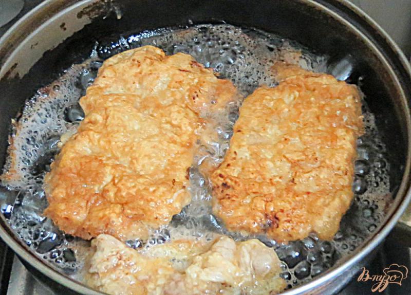 Фото приготовление рецепта: Свиная отбивная маринованная в горчице и в молоке шаг №7