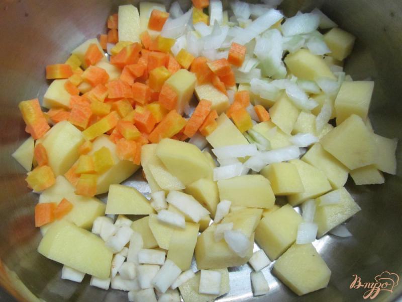 Фото приготовление рецепта: Суп с рисом и тыквой на утином бульоне шаг №2
