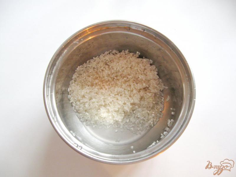 Фото приготовление рецепта: Как правильно сварить рисовую молочную кашу шаг №2