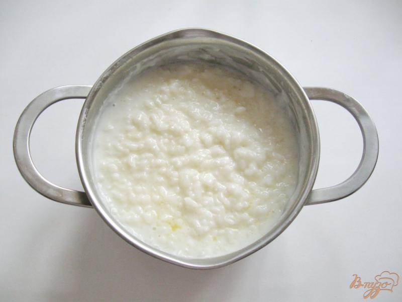 Фото приготовление рецепта: Как правильно сварить рисовую молочную кашу шаг №6