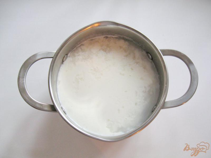 Фото приготовление рецепта: Как правильно сварить рисовую молочную кашу шаг №4