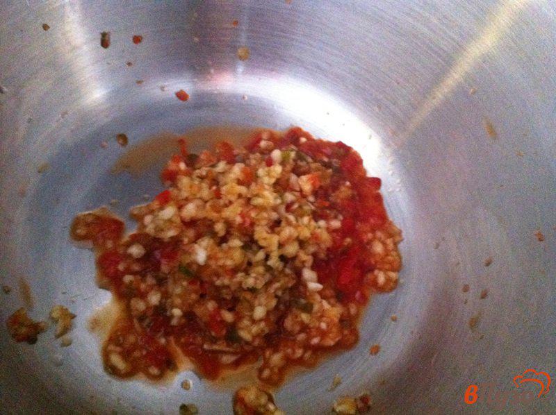 Фото приготовление рецепта: Острая приправа из сладкого перца и помидор шаг №7
