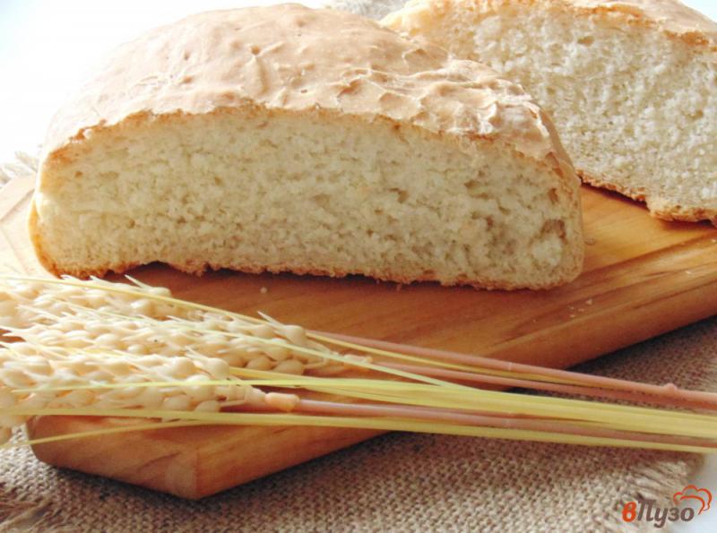 Фото приготовление рецепта: Домашний пшеничный хлеб шаг №7