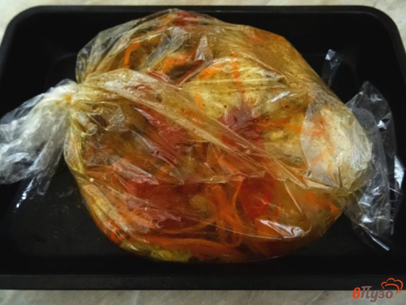 Фото приготовление рецепта: Куриная грудка с апельсином в рукаве шаг №7