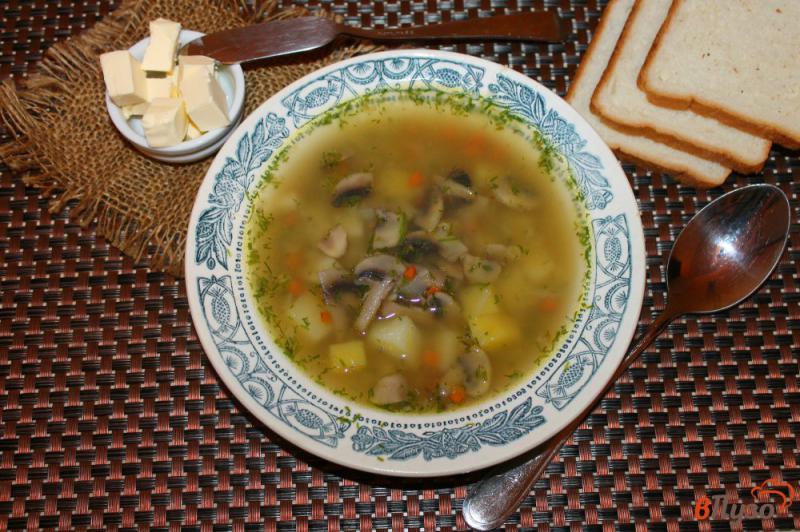 Фото приготовление рецепта: Гороховый суп с шампиньонами шаг №8