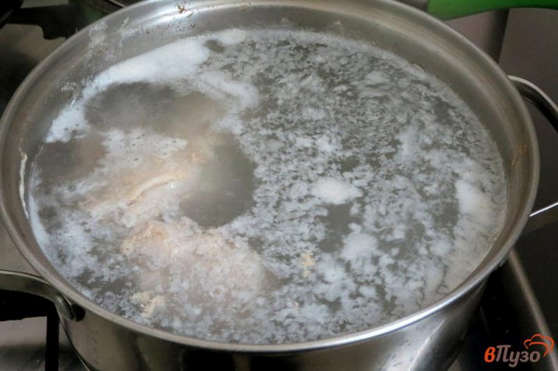 Фото приготовление рецепта: Суп из свинины с рисом шаг №5