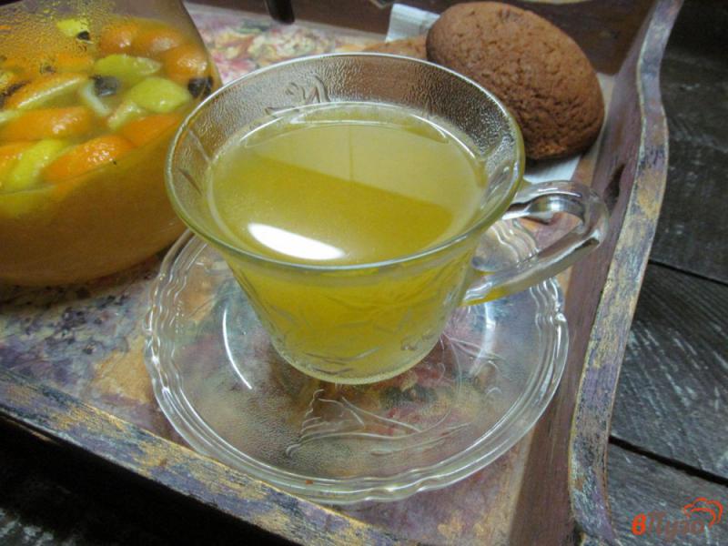 Фото приготовление рецепта: Чай облепихово-апельсиновый шаг №5