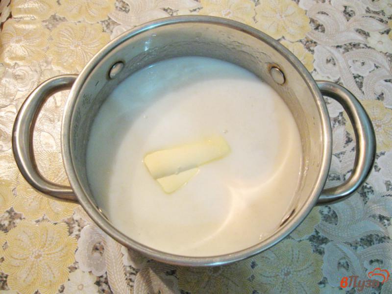 Фото приготовление рецепта: Сладкая рисовая каша с изюмом шаг №5