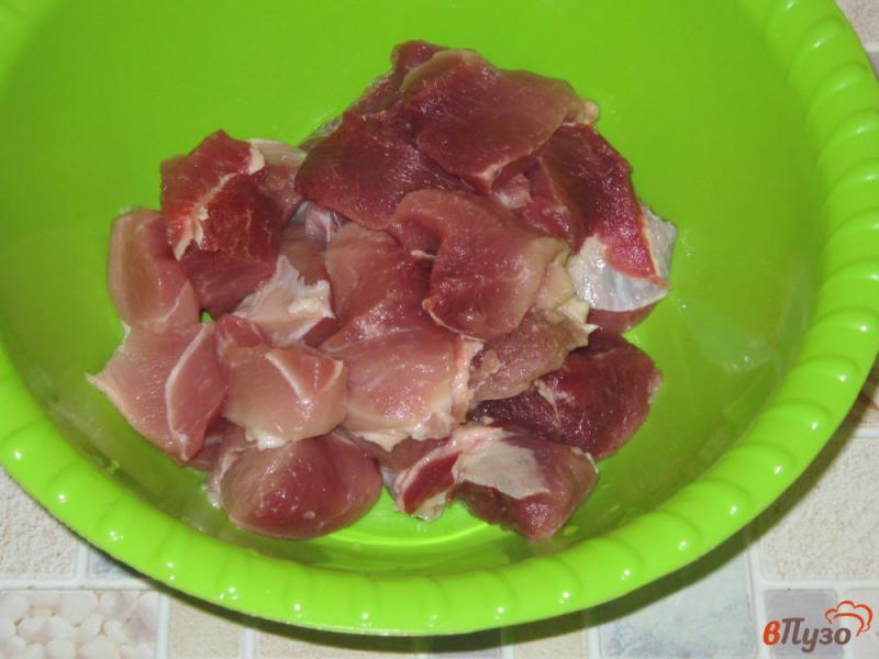 Фото приготовление рецепта: Фаршированный перец свининой, рисом и кабачком шаг №1