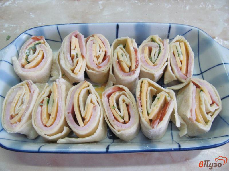 Фото приготовление рецепта: Пирожки из слоеного теста с начинкой шаг №5