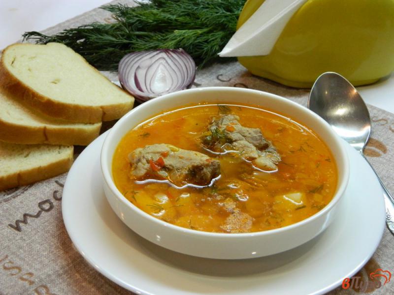 Фото приготовление рецепта: Картофельный суп со свиными ребрышками шаг №6