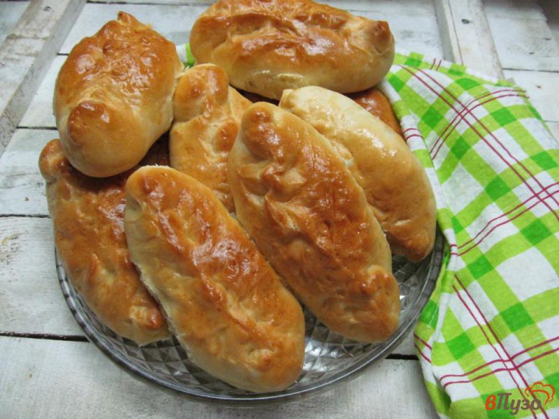 Фото приготовление рецепта: Пирожки с капустой на сдобном тесте шаг №9