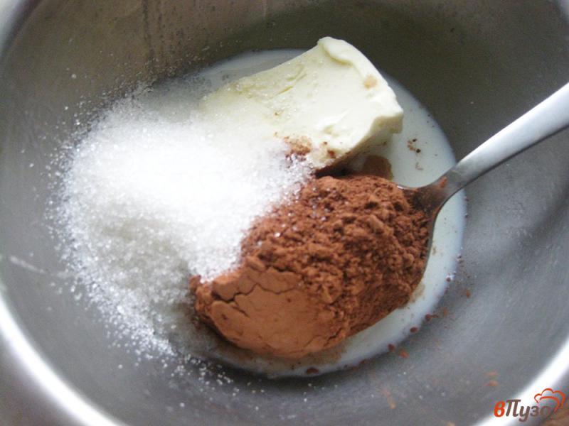 Фото приготовление рецепта: Маффины в шоколадной глазури шаг №11