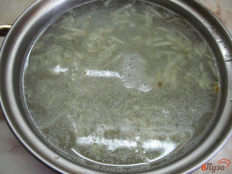Фото приготовление рецепта: Огирчанка - суп из квашеных огурцов с крупой шаг №2