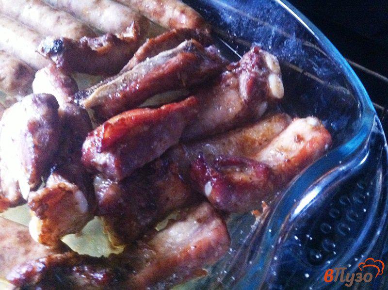 Фото приготовление рецепта: Свиные ребрышки в соусе барбекю шаг №4