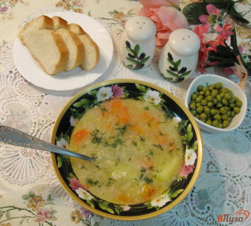 Фото приготовление рецепта: Суп с овсяными хлопьями и зеленым горошком шаг №6