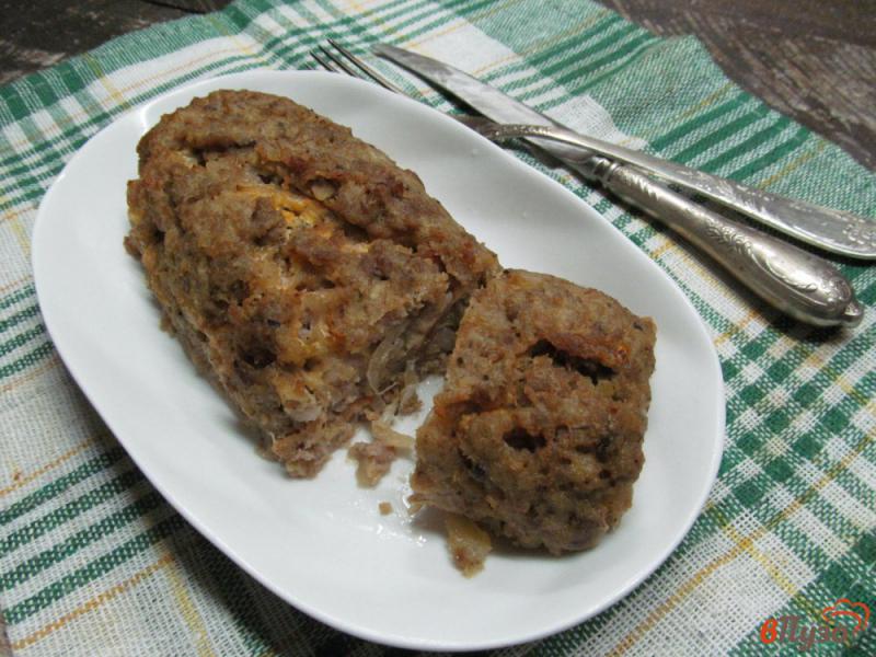 Фото приготовление рецепта: Мясной рулет с начинкой из помидора и каперсов шаг №7