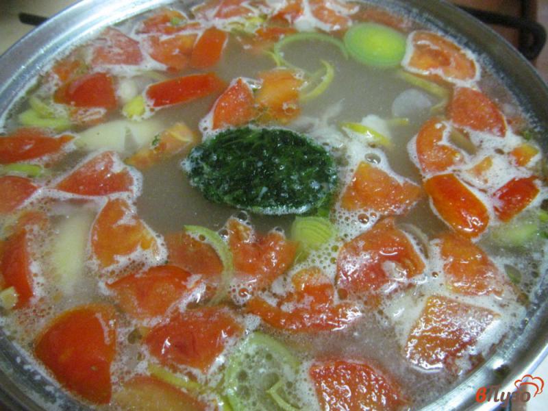 Фото приготовление рецепта: Суп с фасолью и томатами на бульоне из баранины шаг №6