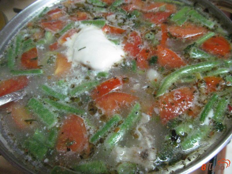 Фото приготовление рецепта: Суп с фасолью и томатами на бульоне из баранины шаг №8