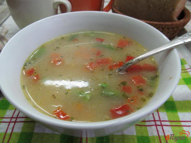 Фото приготовление рецепта: Суп «садовника» с фасолью горошком и помидором шаг №7