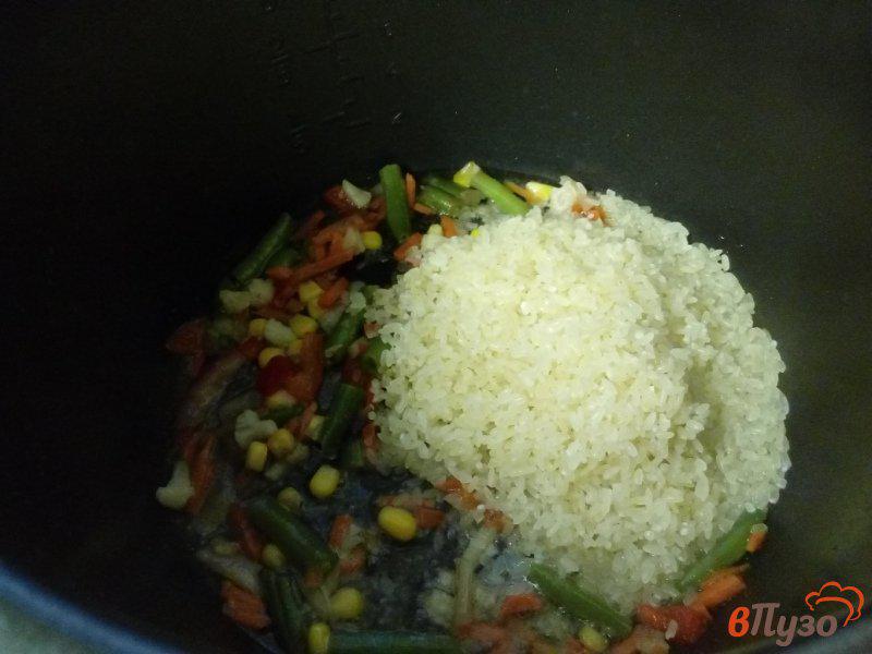 Фото приготовление рецепта: Экспресс-ужин из минтая и риса с овощами в мультиварке с давлением шаг №2