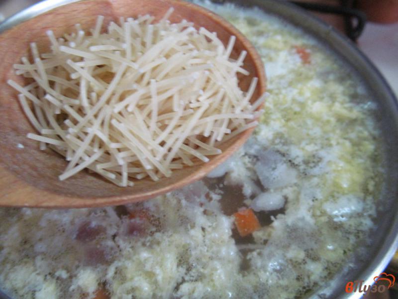 Фото приготовление рецепта: Картофельный суп с яйцом на беконе шаг №7