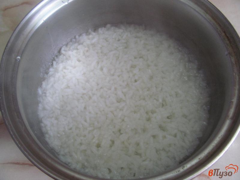 Фото приготовление рецепта: Рисовая каша с горошком и сладким перцем шаг №1