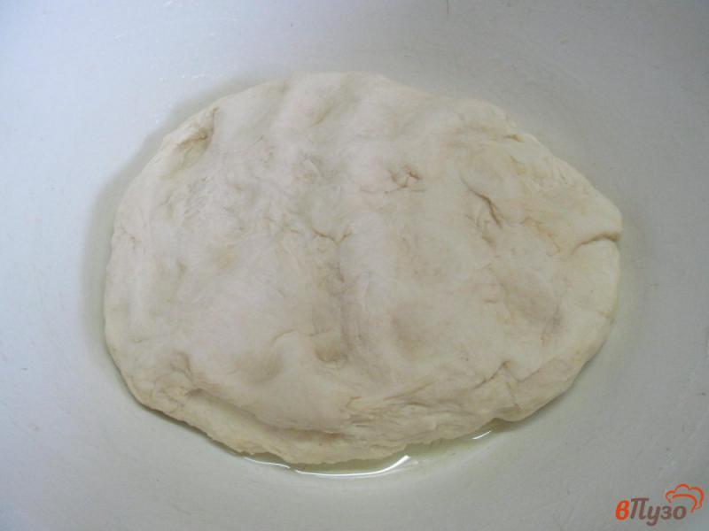 Фото приготовление рецепта: Слоеные булочки из дрожжевого теста шаг №4