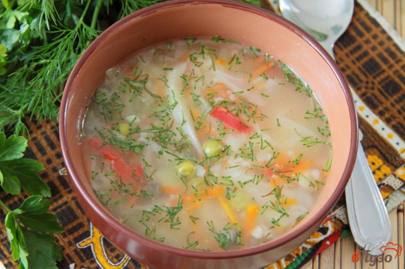 Фото приготовление рецепта: Овощной суп с рисом и зеленым горошком в мультиварке шаг №8
