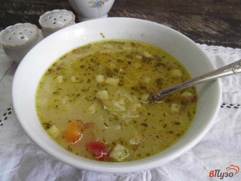 Фото приготовление рецепта: Рисовый суп с капустой на беконе шаг №7