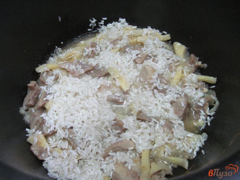 Фото приготовление рецепта: Свинина с рисом и морковью по-корейски в мультиварке шаг №4