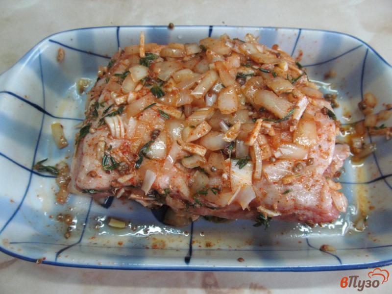 Фото приготовление рецепта: Запеченные свиные ребра с гарниром из капусты шаг №3