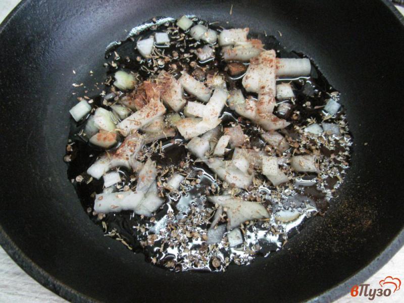 Фото приготовление рецепта: Запеченные свиные ребра с гарниром из капусты шаг №4
