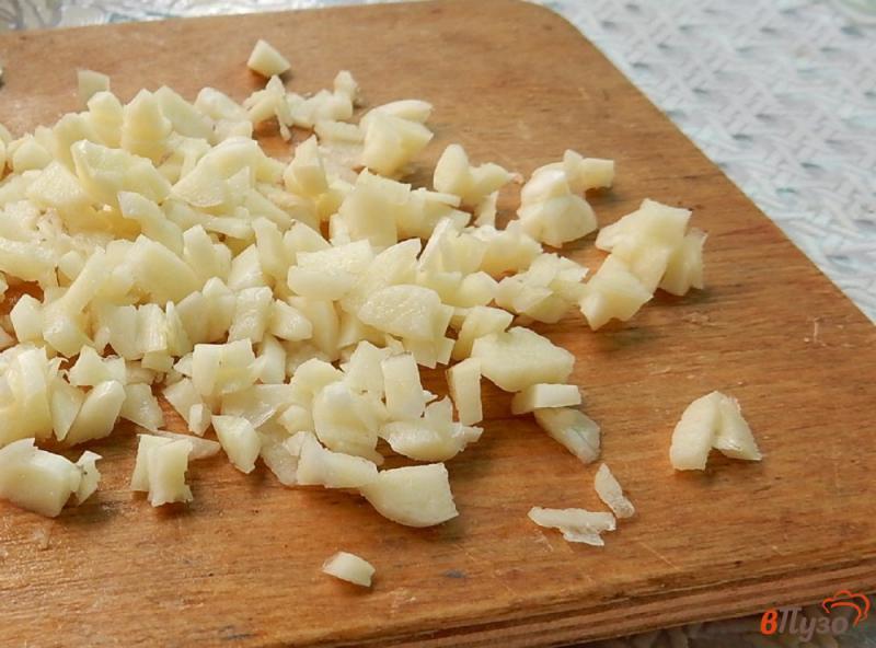 Фото приготовление рецепта: Салат из огурцов с чесноком на зиму шаг №4