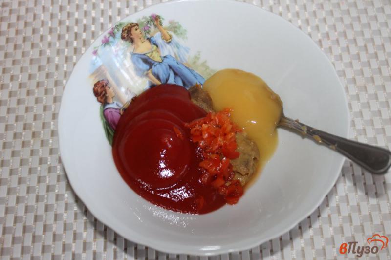 Фото приготовление рецепта: Куриные крылья запеченные в томатно - медовом соусе с чили шаг №4